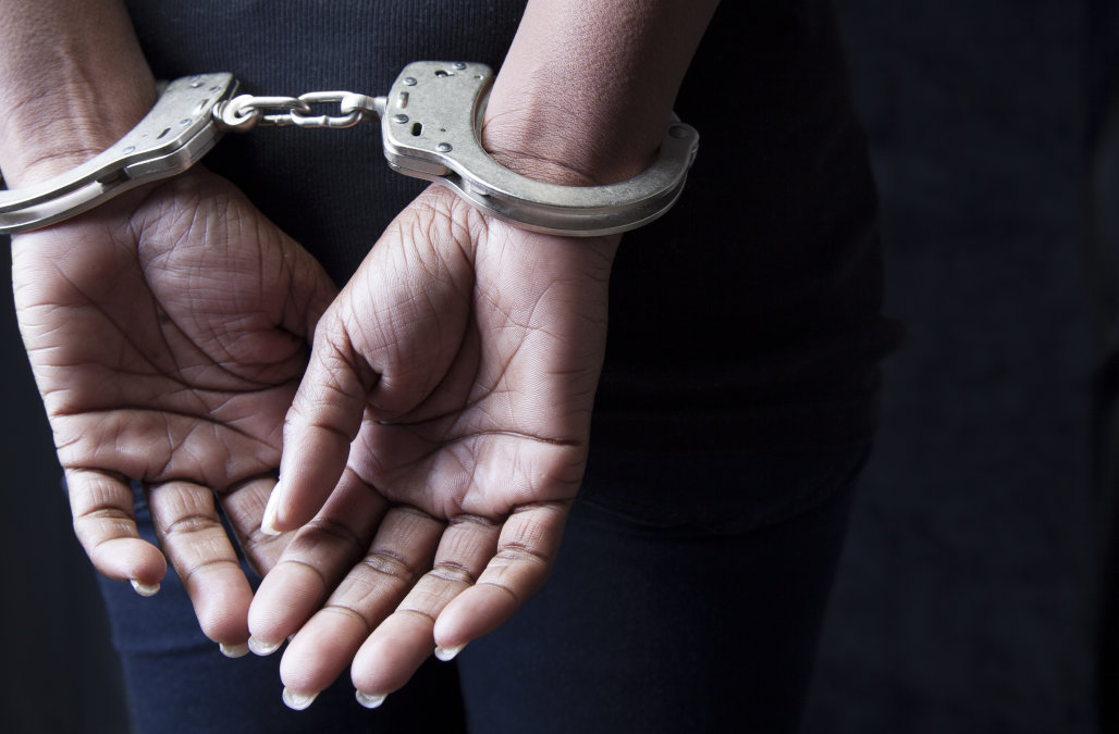 Central woman held for assaulting husband