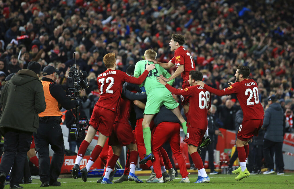 Liverpool edge Arsenal on penalties after 10-goal thriller