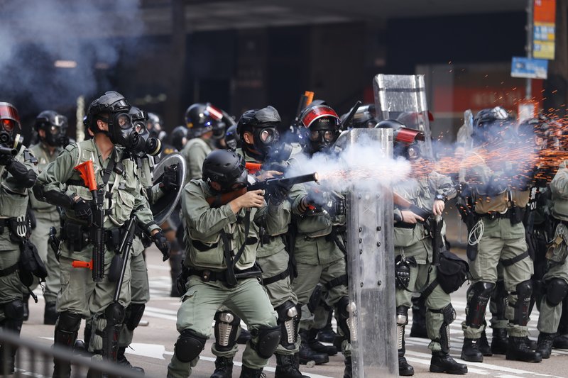 Chinese Soldiers Warn Protesters in Hong Kong