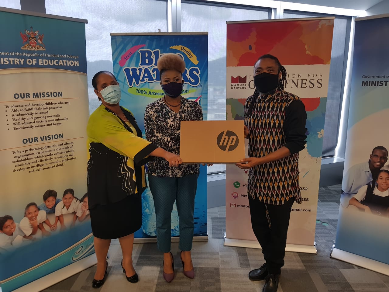Machel Montano donates devices to the Education Ministry