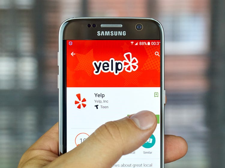 Yelp to label pages of businesses accused of racism