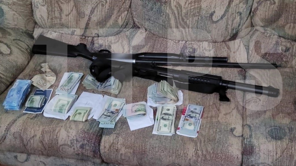 Couva man held with guns, ammo and foreign currency