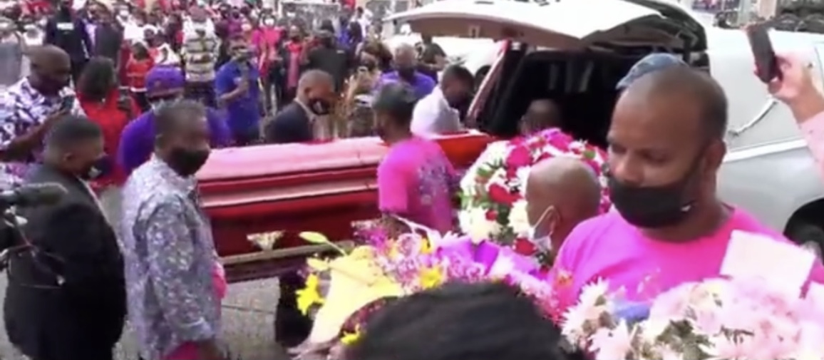Andrea Bharatt’s body and coffin being taken into church