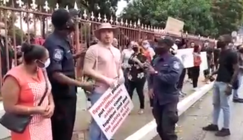 WATCH: Gerard Aboud and another man arrested while protesting at Woodford Square