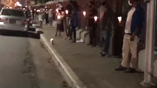 In Memory of Andrea! Citizens turn out for candlelight memorial opposite Red House