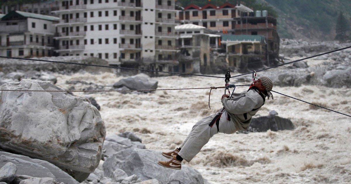 Over 150 people feared dead after glacier crashes into dam in India