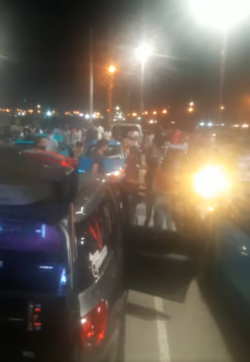 WATCH: Trinis flout Covid rules with big lime outside Heartland Plaza, Chaguanas