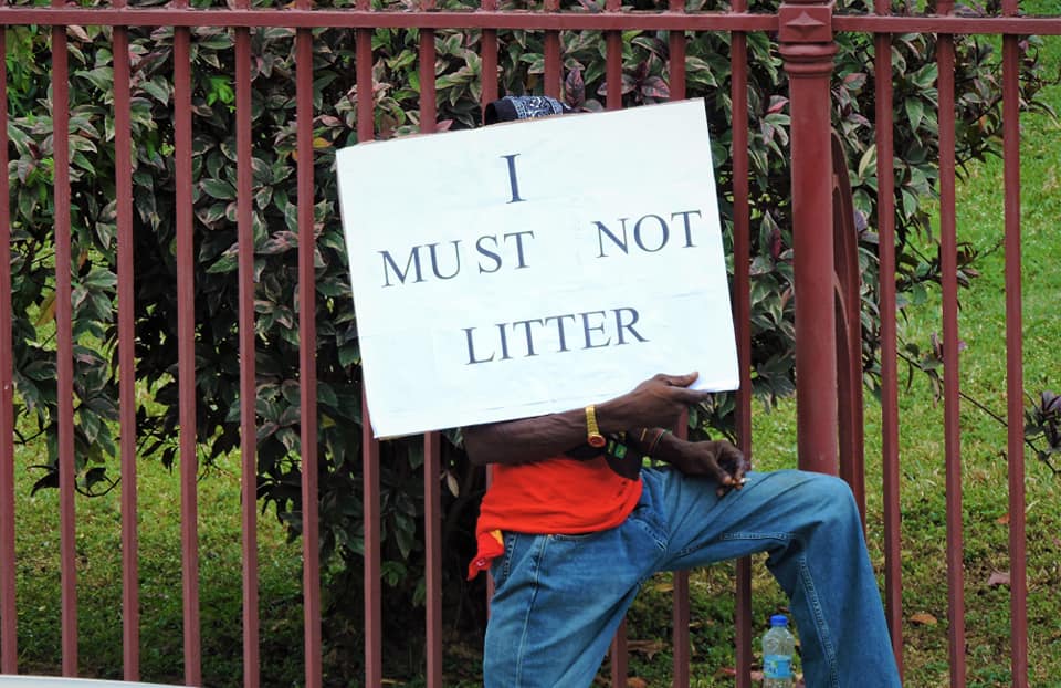 ‘Litter-bug’ made to hold “I must not litter” sign