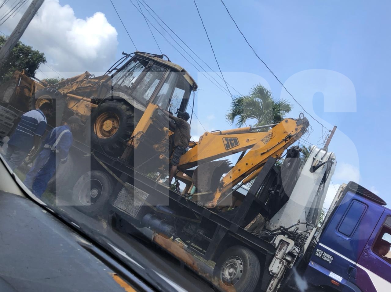 Stolen backhoe and getaway car recovered by cops