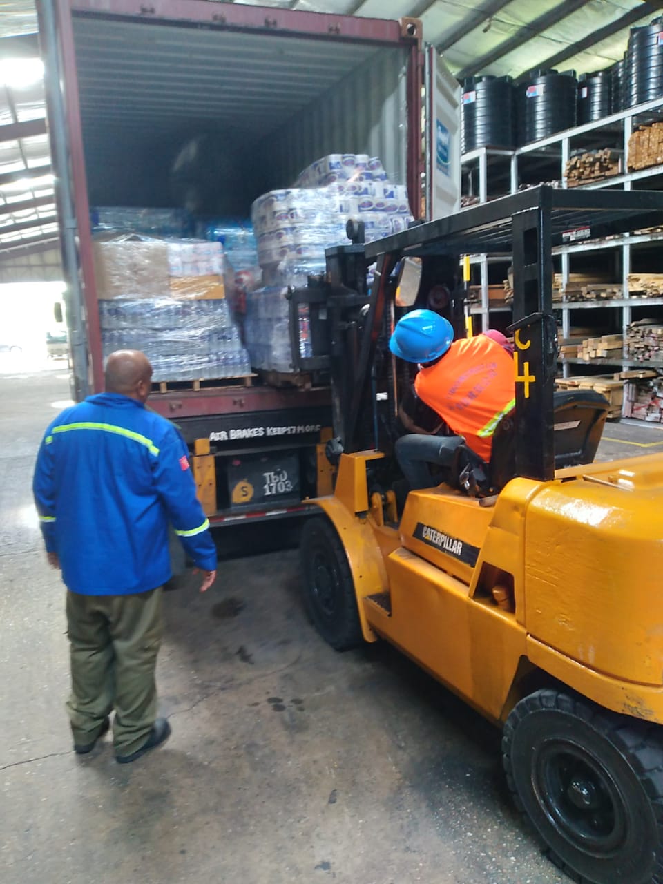 Bhagwansingh dispatched a container with water, food items and medical supplies to SVG