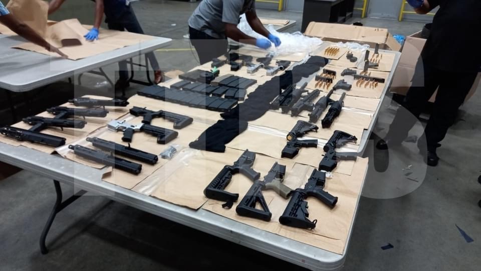 Large cache of arms and ammo seized at Piarco Bond