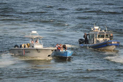 Coast Guard intercepts boat; 3 men held with gun and ammo