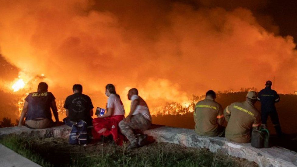 Mass evacuations in Greece as deadly wildfires spread