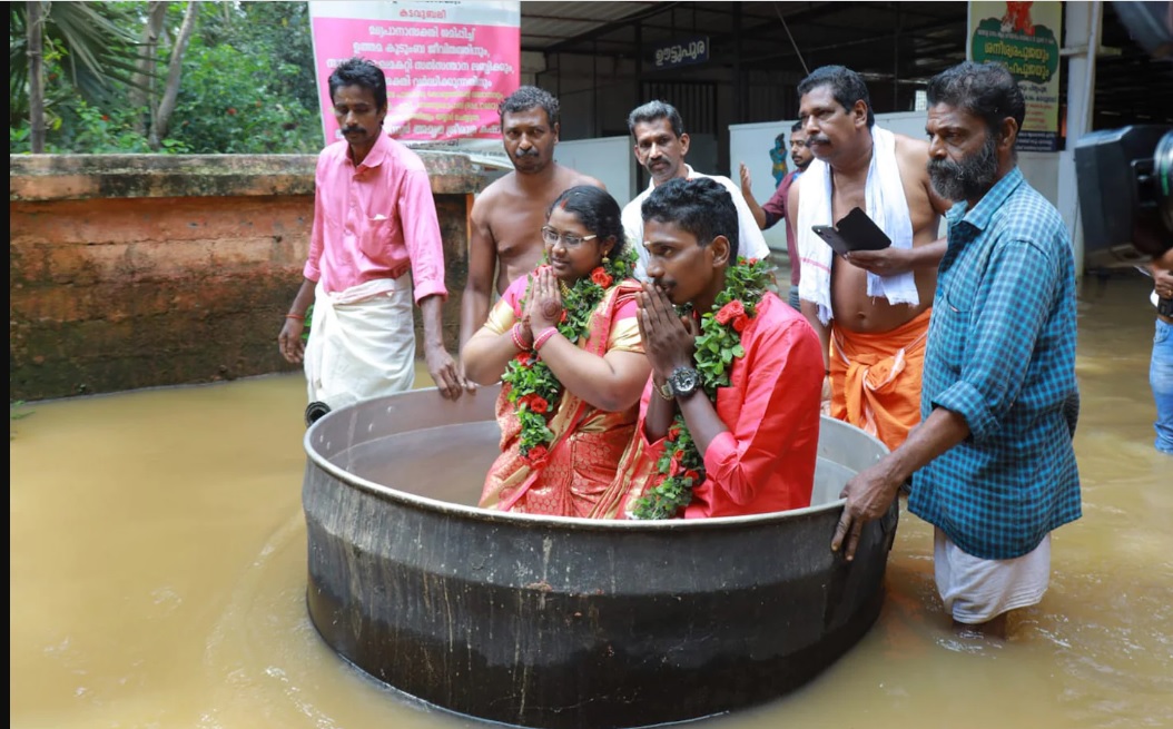 Indian couple floats to wedding in GIANT cooking pot
