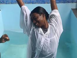 Buju Banton’s daughter resurfaces and gets baptized