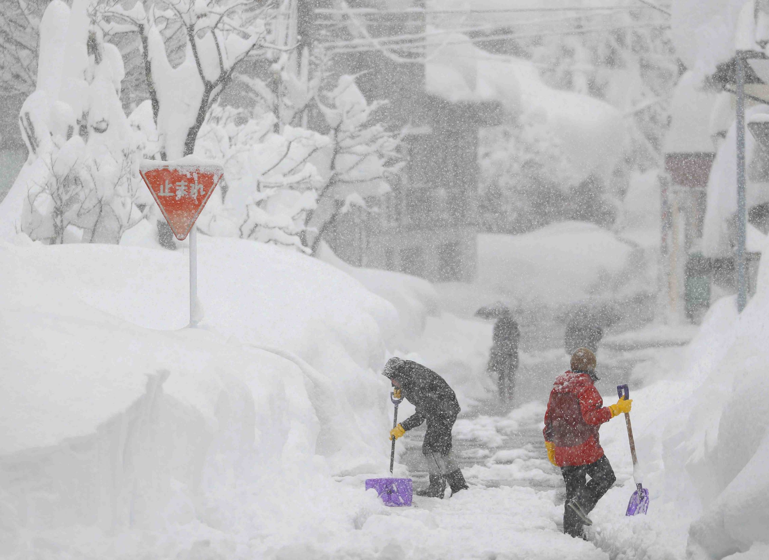 Record snowfall hits western Japan causing severe delays