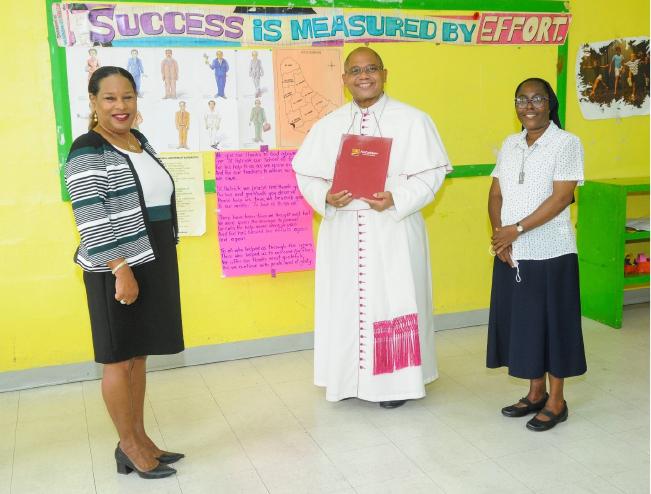 Michael Mansoor Scholarship Funds presented to new Bishop in Barbados