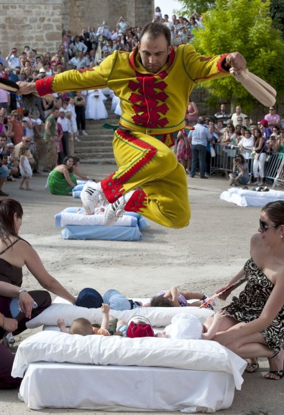 Devils jump over babies in Spanish village’s unusual festival