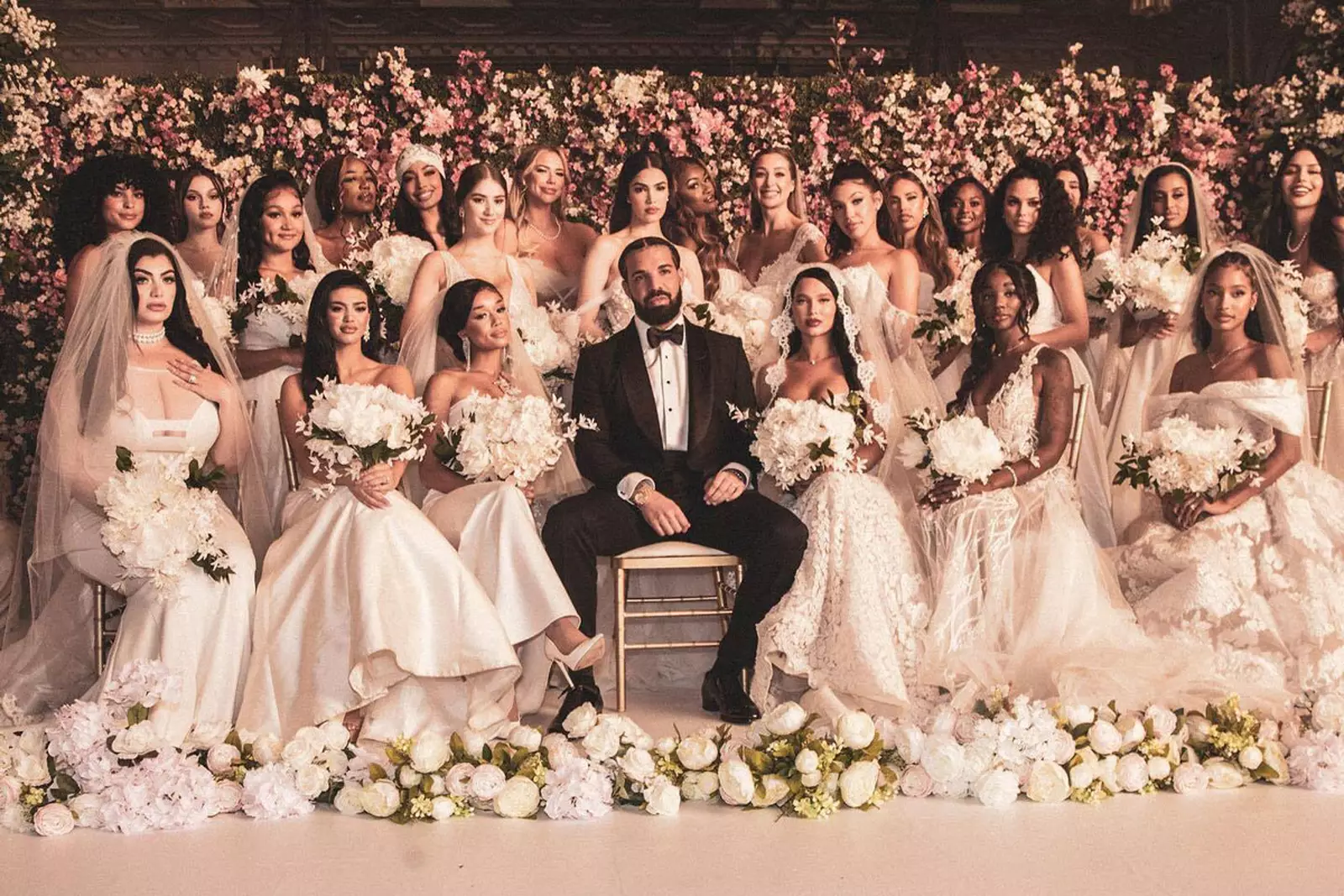 Drake surprises fans with new album then marries 23 women in new video