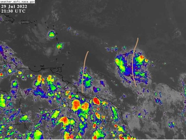Showers expected as 2 tropical waves approach