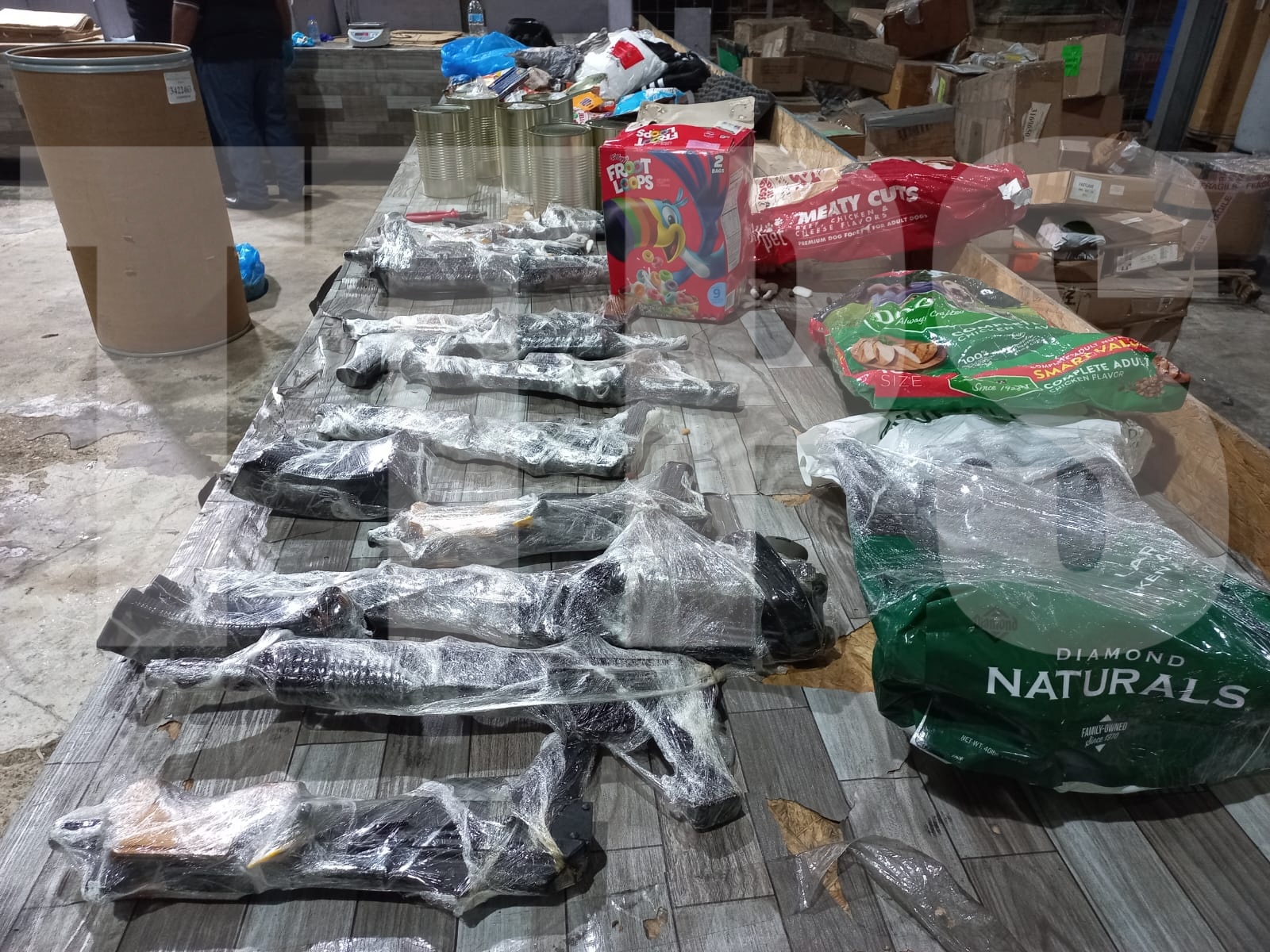 Police seize high powered weapons, ammo and $2.6M in weed at Central Bon