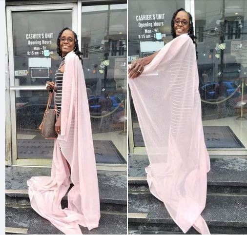 Woman wears curtain after being denied entry to a govt building for her dress