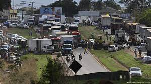 Brazil election: Bolsonaro supporters block roads after poll defeat