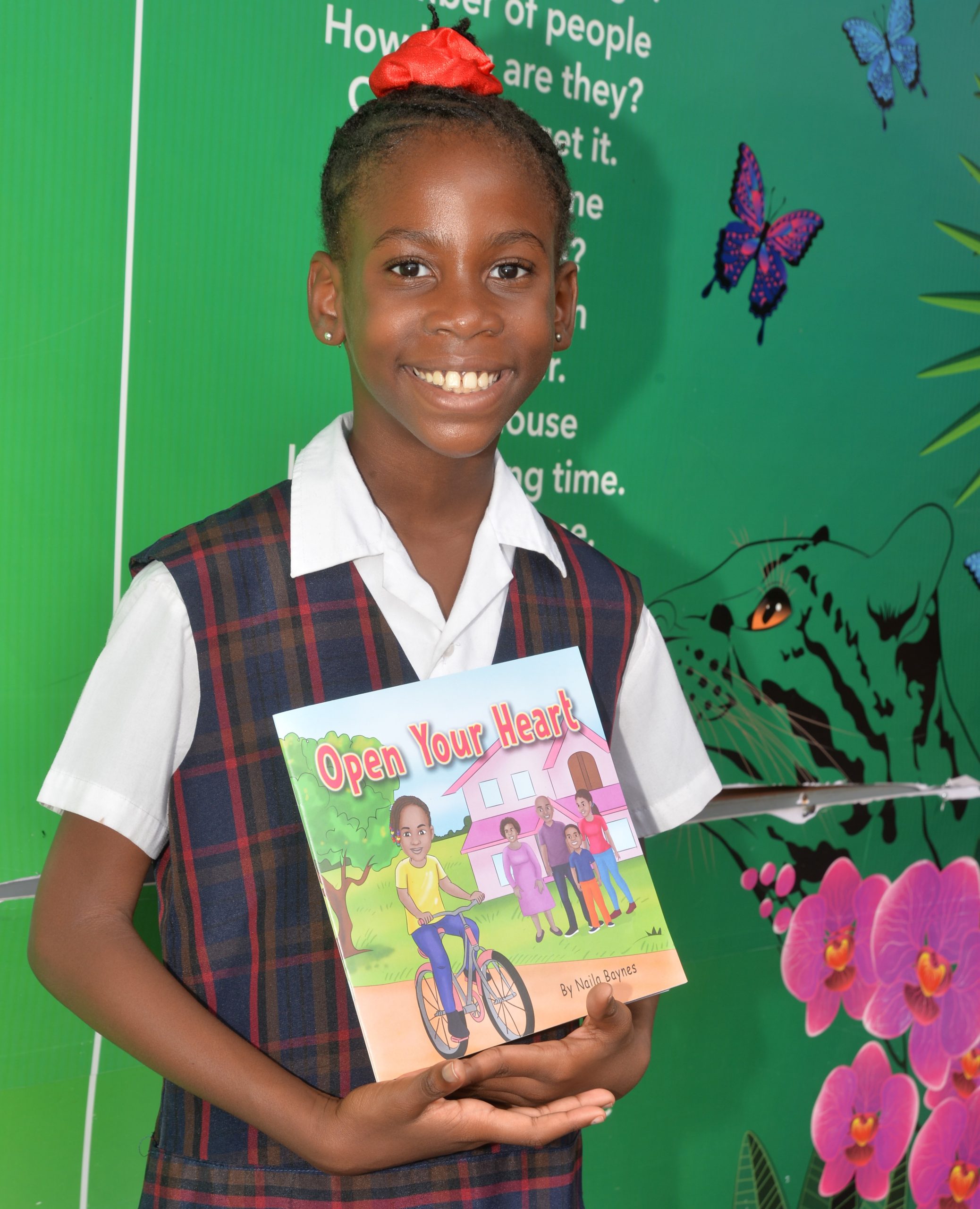 8-year-old Naila Baynes launches debut book “Open Your Heart”