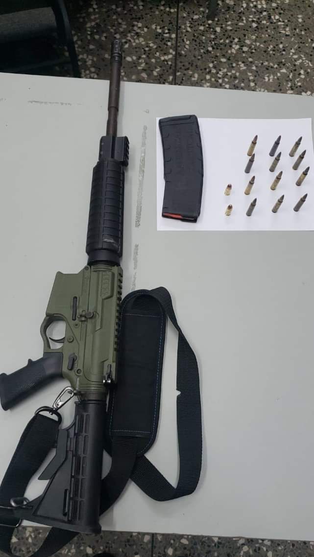 Nine arrested, AR-15 rifle among seven guns seized  