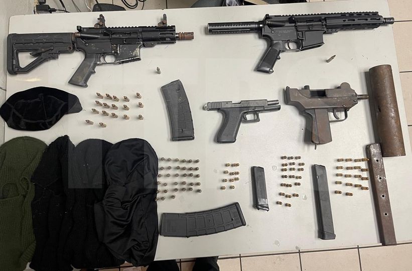 Police arrest 11, seize 2 AR-15 rifles and ammo