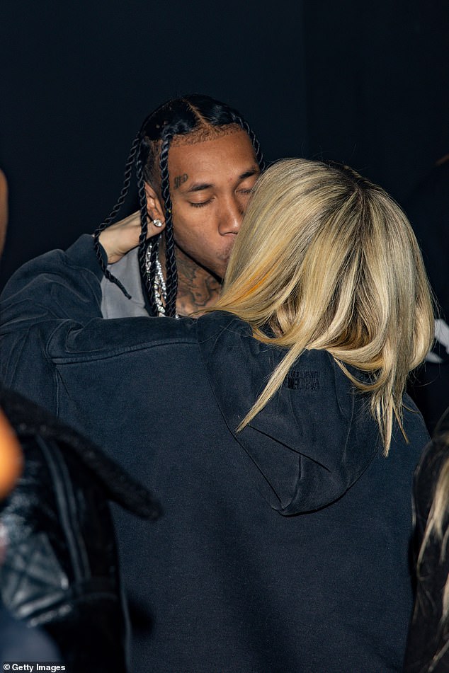 Tyga and Avril Lavigne made their romance official with a kiss?