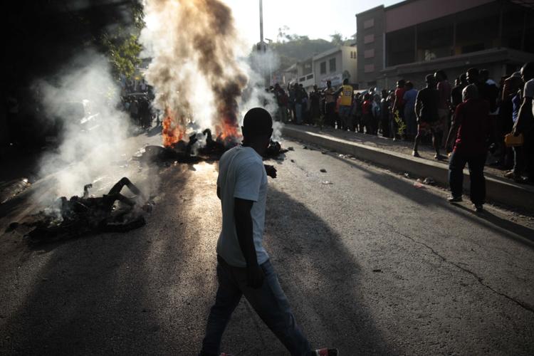 Mob burns suspected gang members to death in Haiti