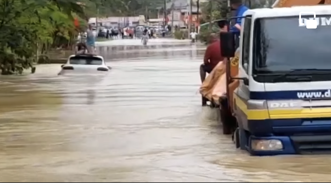 Sangre-Grande Regional Corporation Assist In Recuse Of Vehicle Caught In Flood