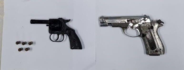 2 men arrested, 2 guns seized during overnight police exercise in North Central Division