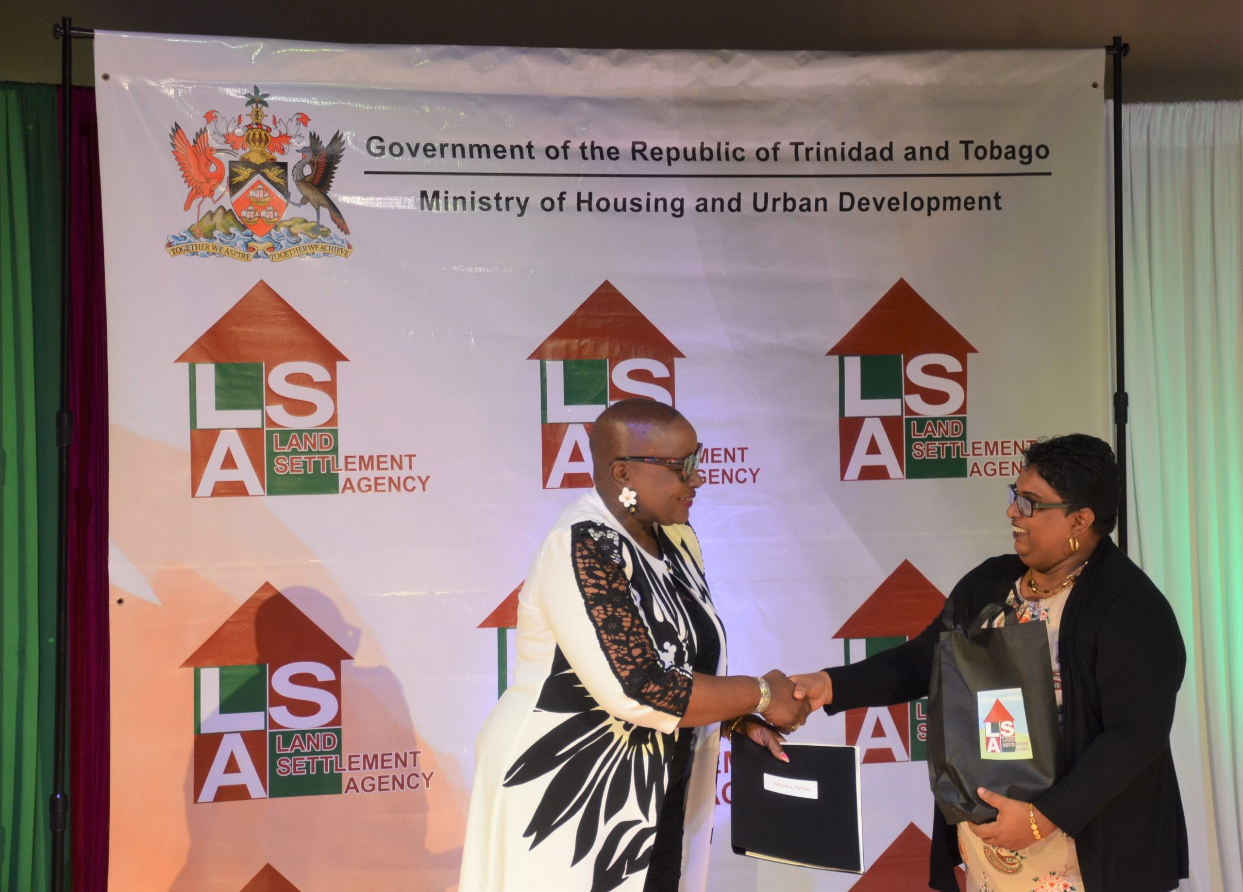 Beneficiaries Receive Deeds To Residential Lots From Housing Ministry