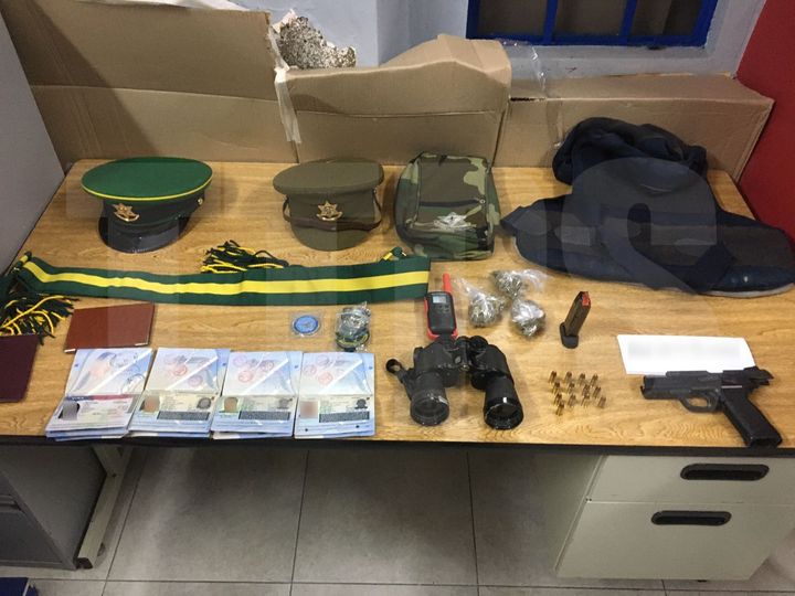 Man held with Regiment issued items, drugs, firearm and ammo