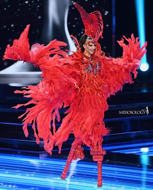 Miss Universe Trinidad and Tobago walks on stilts at pageant’s costume show