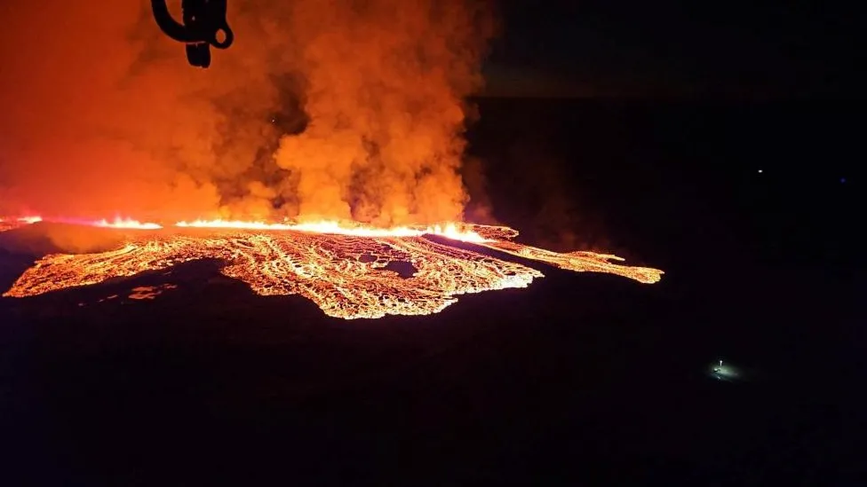 Houses on fire as lava spills into Iceland town