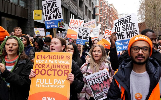 Thousands of doctors in Britain walk off the job