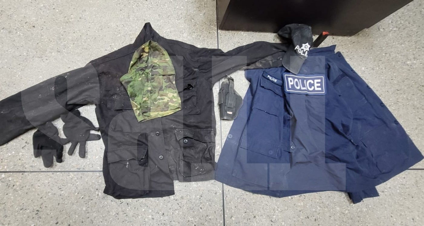 Three firearms, quantity of ammo and ‘police gear’ seized